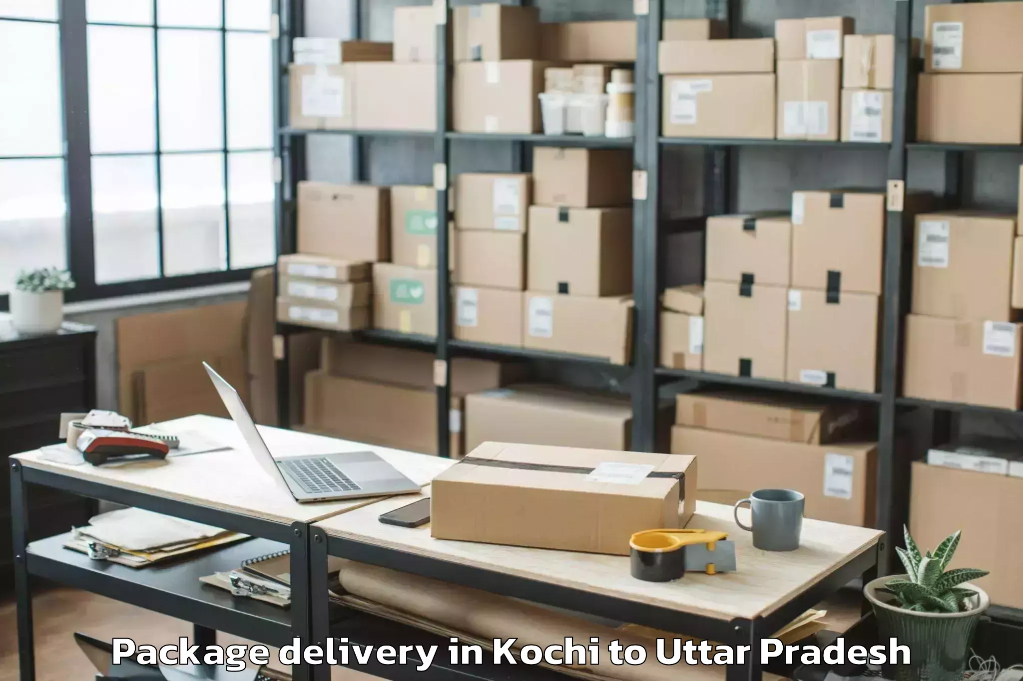 Book Kochi to Chandra Shekhar Azad Universit Package Delivery